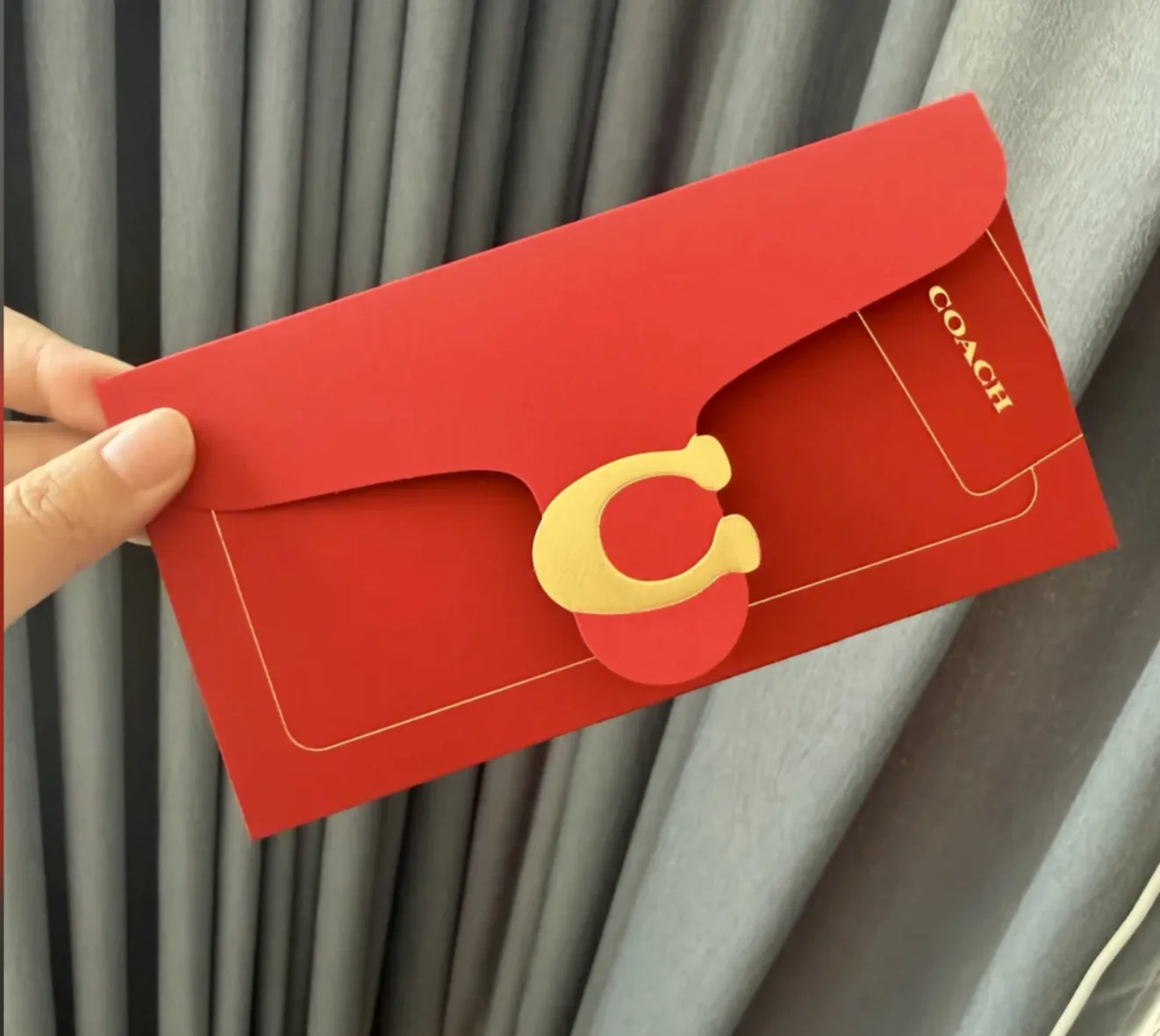 Coach red envelope