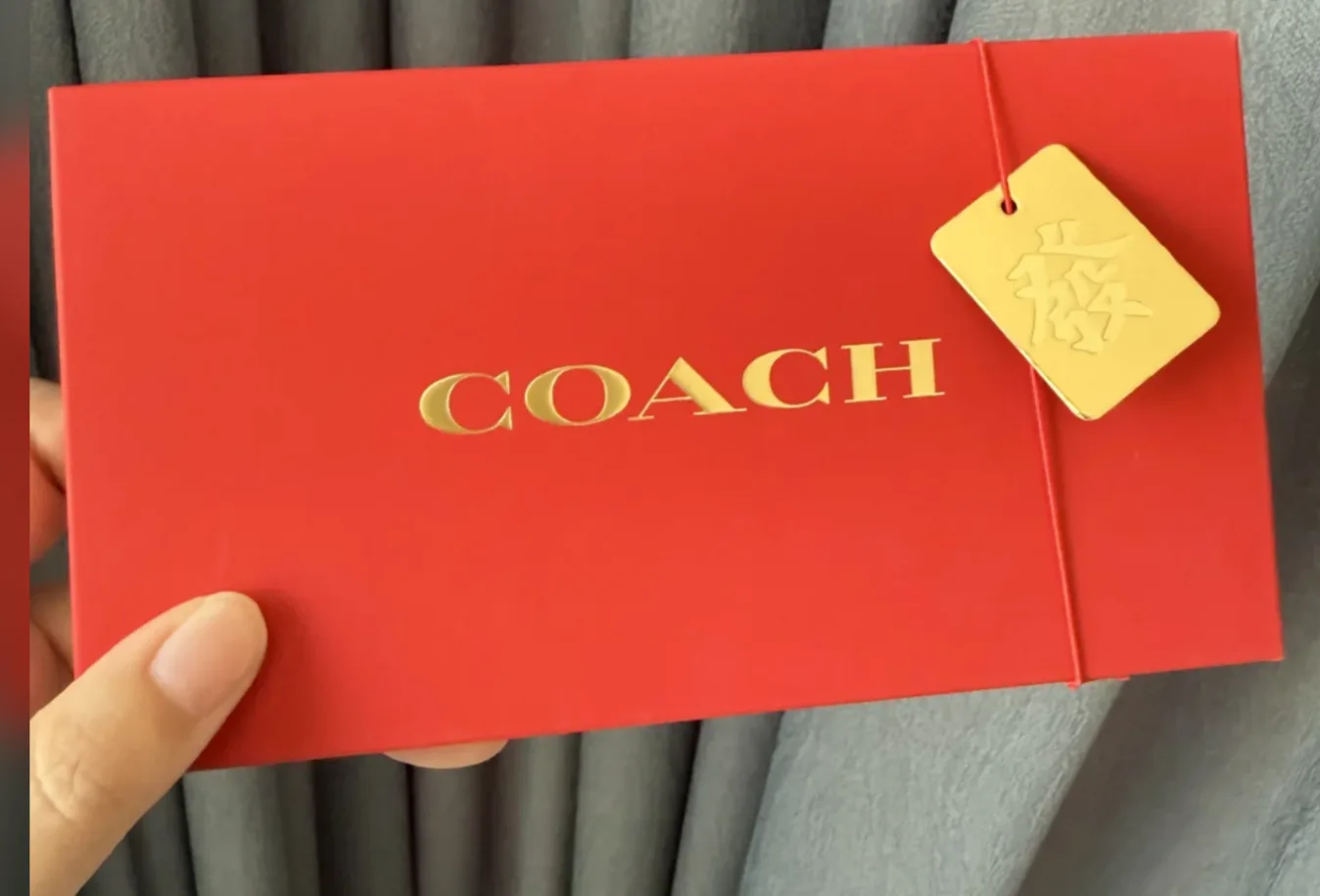 Coach red envelope